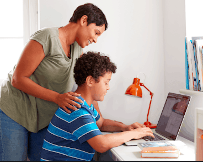 Mom helping son with homework